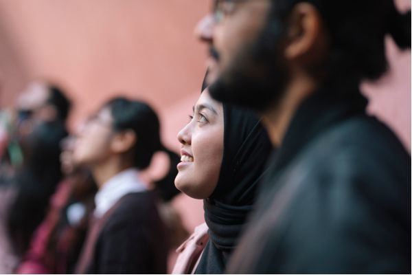 Few international students looking at the sky