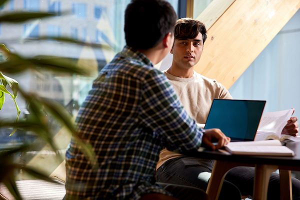 students discussing in a room