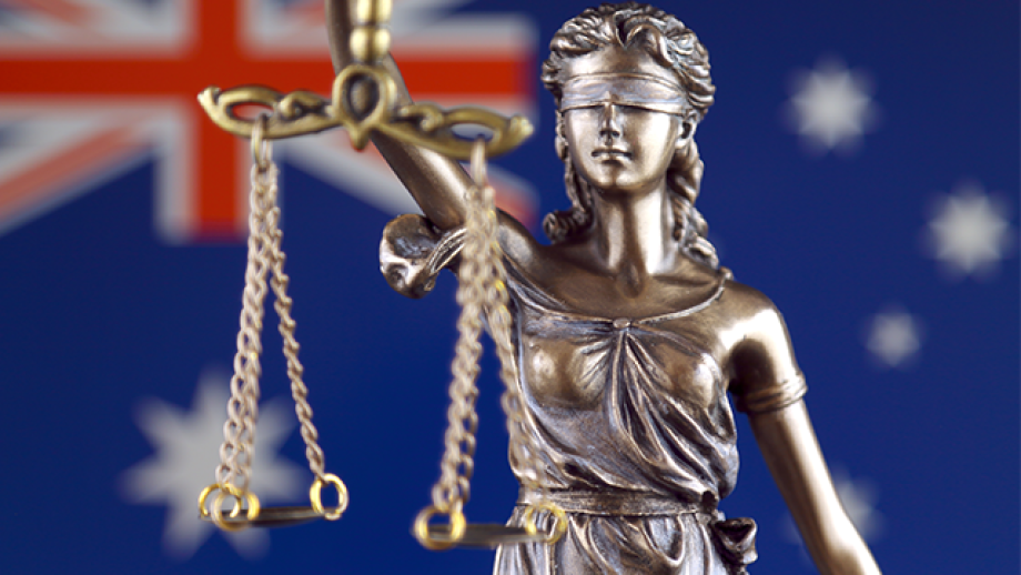 Symbol of law and justice with Australia Flag. Close up.