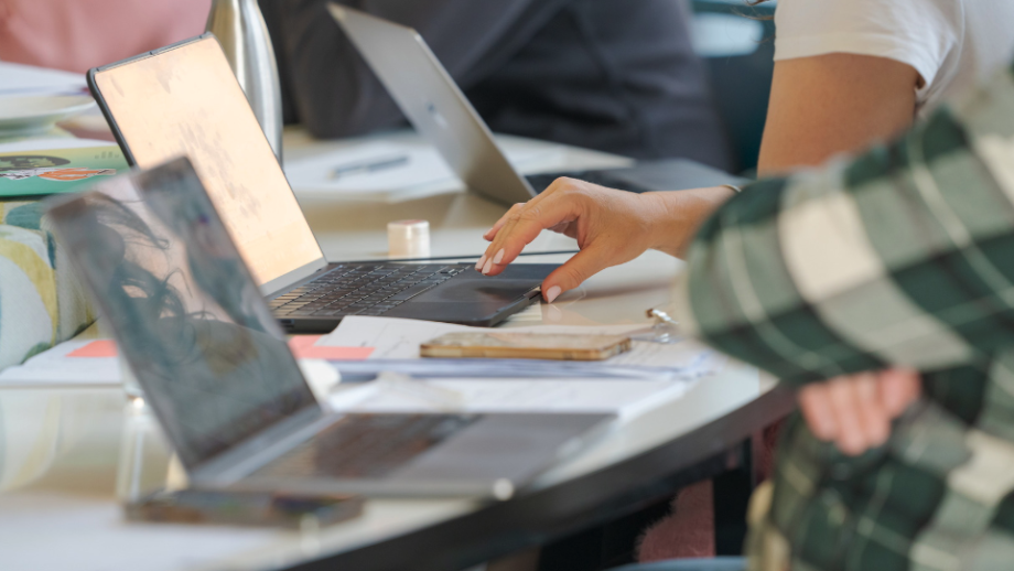 People hands operating laptops.