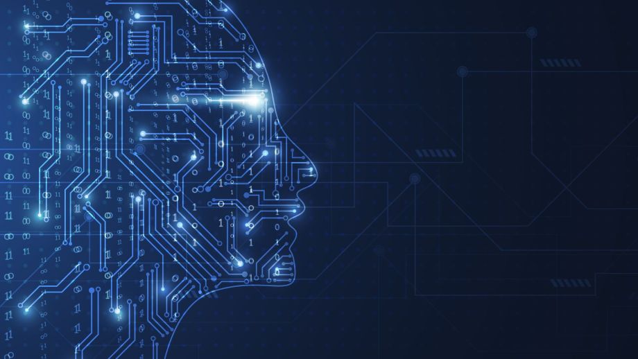 An image of a human head made from binary code and details from a computer chip.