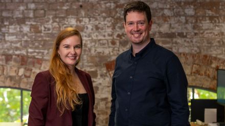 Headshot of two people