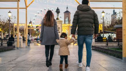 Family walking through a city. 
