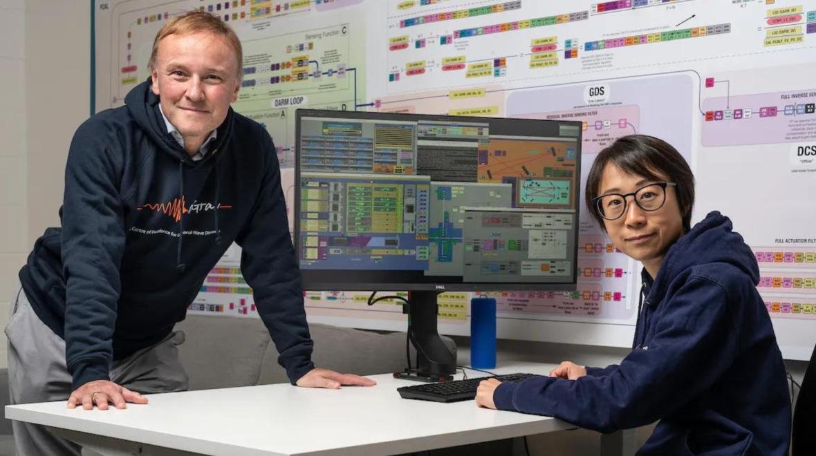 Associate Professor Chris Lidman (L) and Dr Ling (Lilli) Sun in the LIGO control room at the ANU Centre for Gravitational Astrophysics. Photo: Jamie Kidston/ANU.