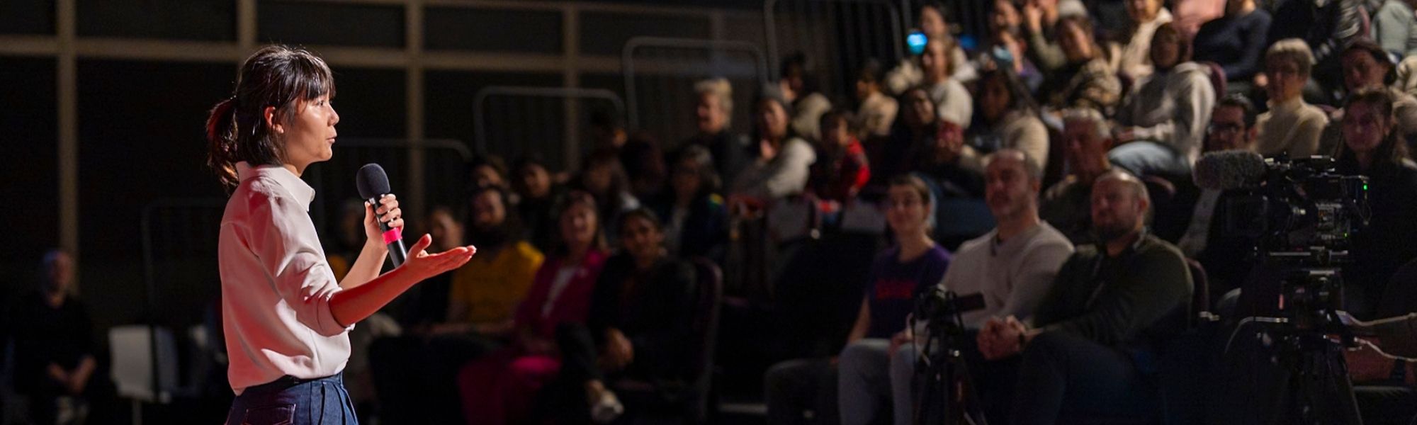 A women gives a speech in ANU 3MT competition
