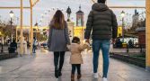 Family walking through a city. 