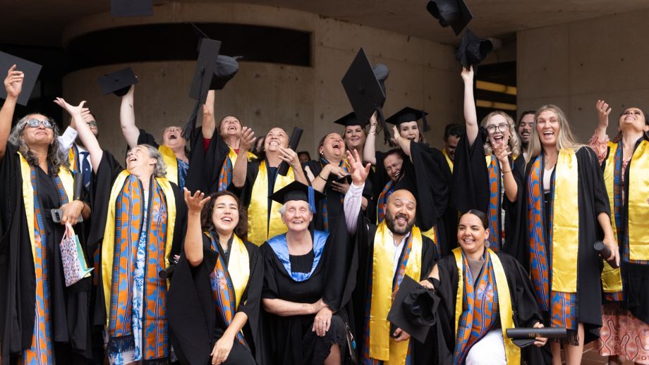 The First Nations Graduate Certificate of Management graduation class of 2026 in their graduation gowns and caps.