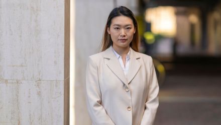 ��������PhD student standing at the ��������campus.