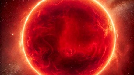 An artistic impression of a red giant star, which is glowing red